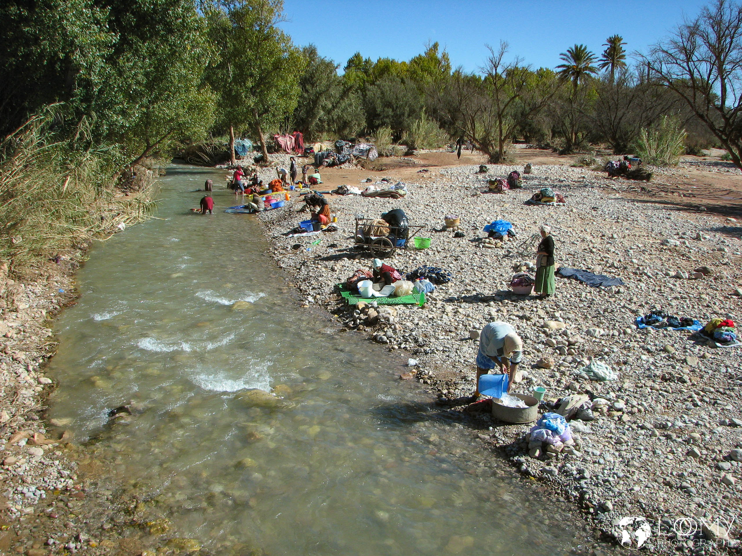 Wäscherinnen am Fluss
